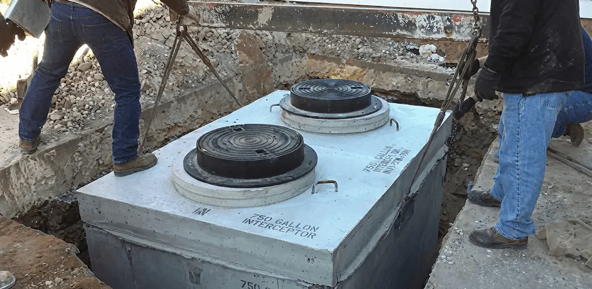 Grease trap installation for a commercial property drainage system in Fort Wayne, IN