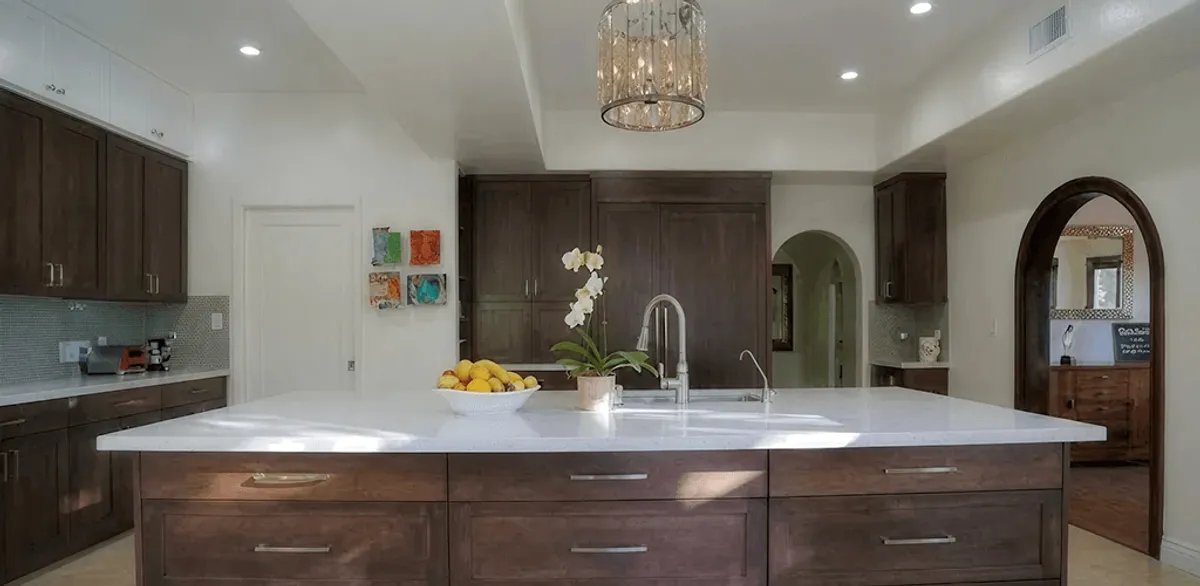 Cabinet refacing project with updated kitchen cabinets and island in Fort Wayne, IN