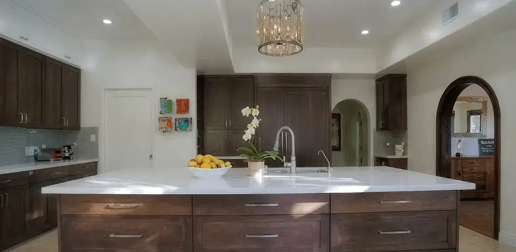 Cabinet refacing project with updated kitchen cabinets and island in Fort Wayne, IN